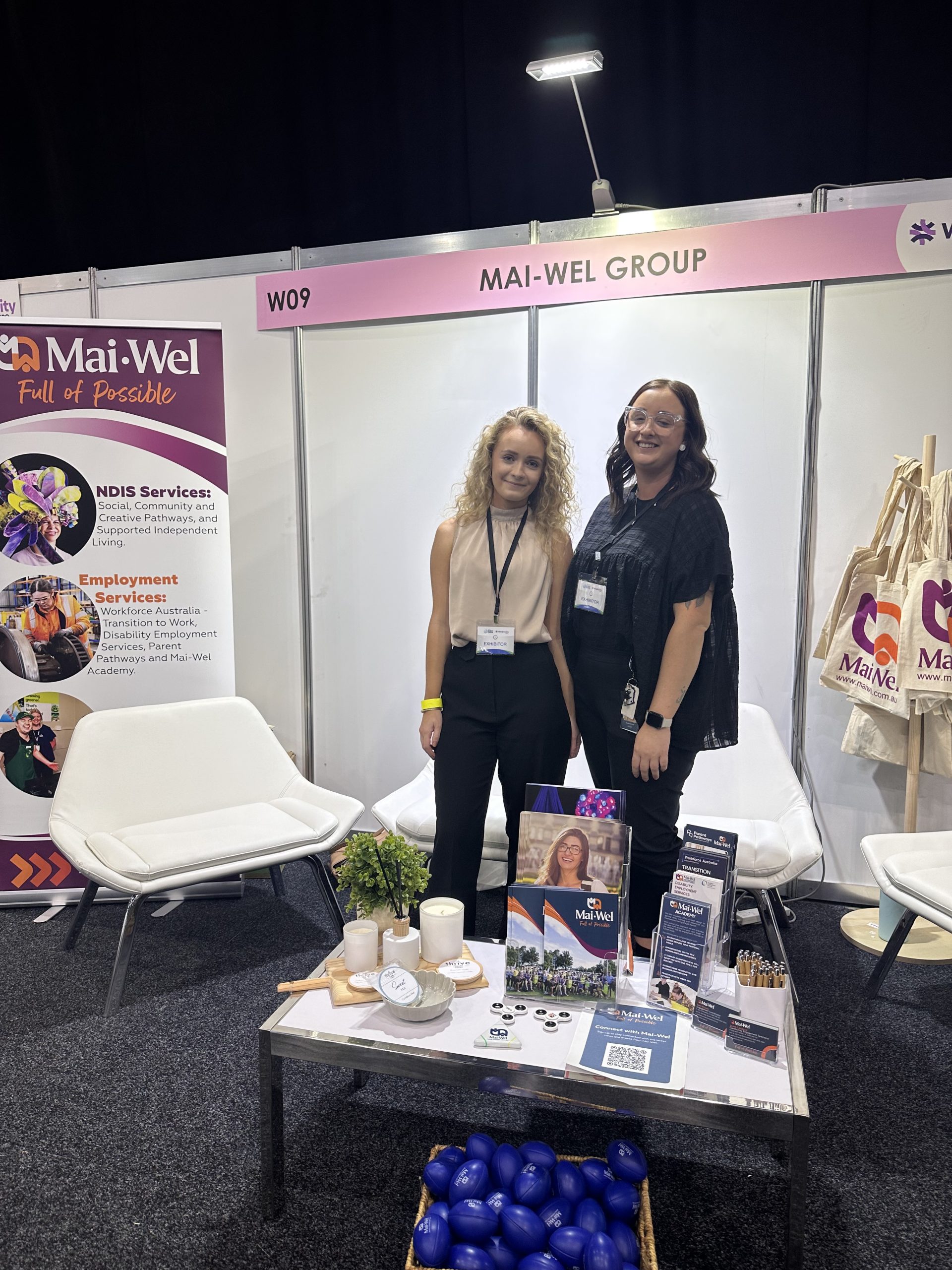 Two Mai-Wel employees manning the Workability stand
